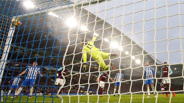 Jose Izquierdo scores Brighton's second goal