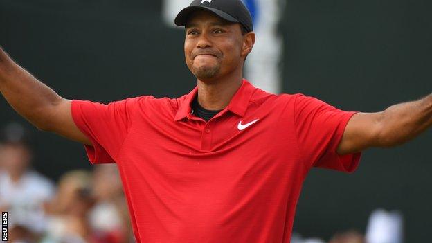 Tiger Woods celebrates