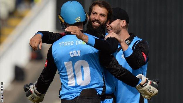 Ben Cox and Moeen Ali celebrate