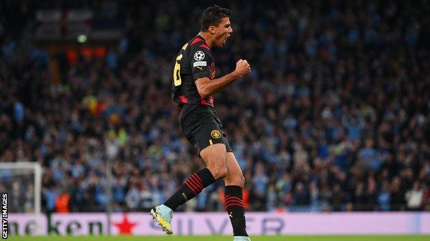 Rodrigo celebrates scoring for Manchester City in the Champions League