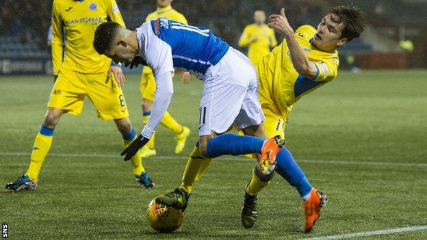 Kilmarnock's Jordan Jones is fouled by St Johnstone's Aaron Comrie