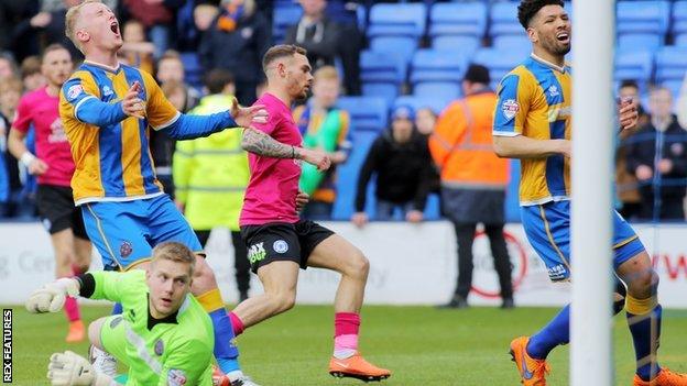 Jon Taylor of Peterborough United scores the winning goal