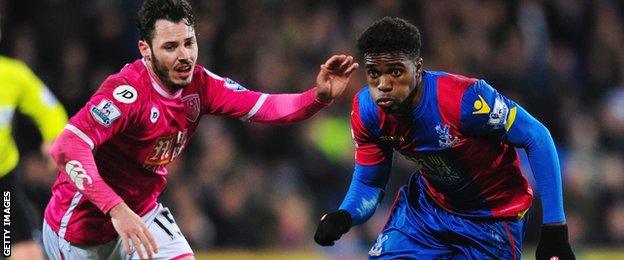 Wilfried Zaha takes on Adam Smith