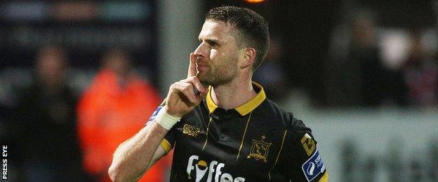 Ciaran Kilduff celebrates after scoring his penalty at the Brandywell