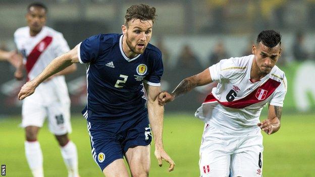 Scotland defender Stephen O'Donnell and Peru's Miguel Trauco