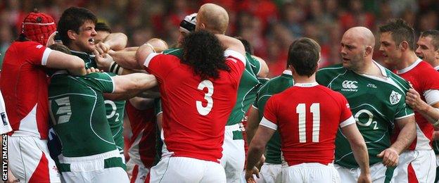 Wales and Ireland players grappling