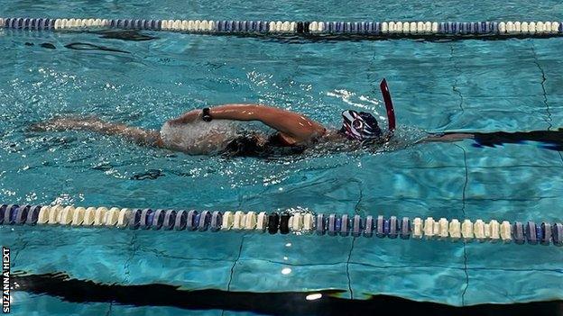 Suzanna Hext returns to the pool after her operation