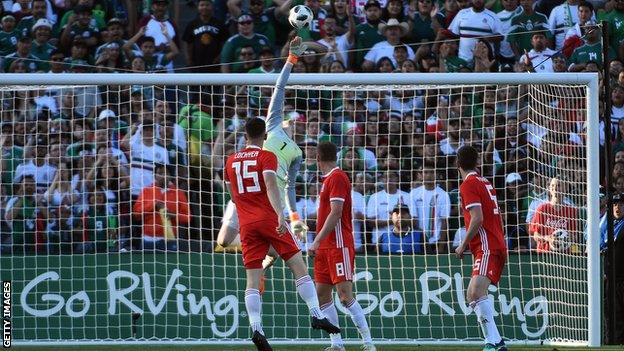 Wayne Hennessey makes a save