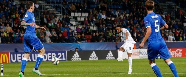 Nathan Redmond scores for England against Italy