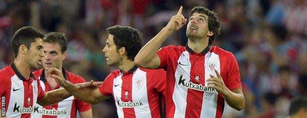 Mikel San Jose celebrates his goal