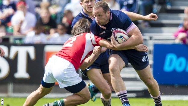 James Eddie of Scotland Sevens takes on Portugal