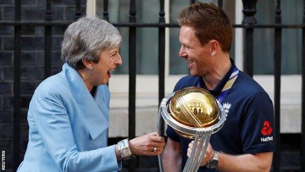 Theresa May and Eoin Morgan