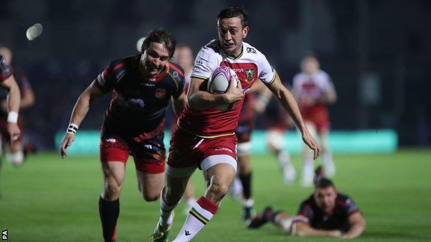 Northampton scrum-half Alex Mitchell outstripped the Dragons defence to score the second try