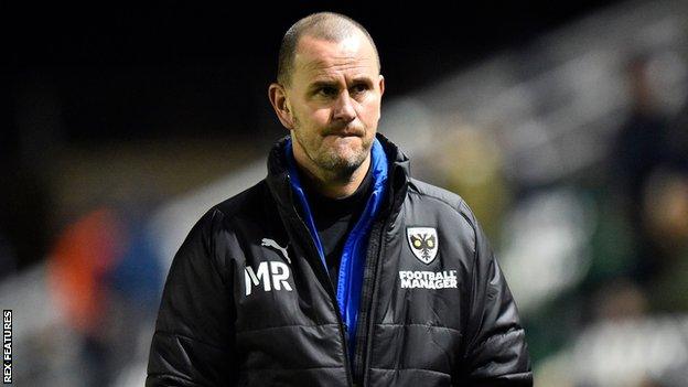 Mark Robinson watches on at AFC Wimbledon