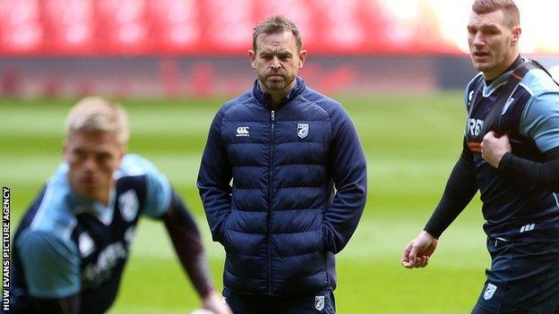 Danny Wilson watches his players preparing for their Judgement Day match with Ospreys