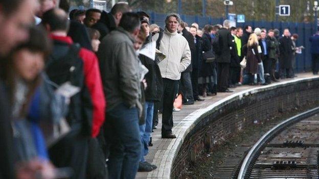 rail platform full of passengers