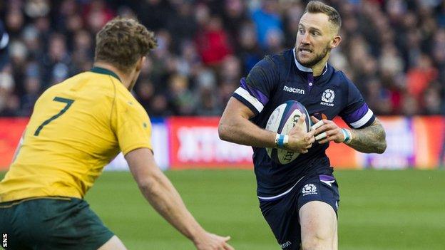 Byron McGuigan playing for Scotland against Australia