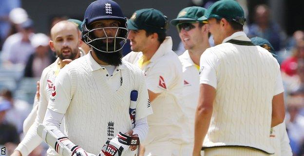 Moeen Ali leaves the field after being dismissed by Nathan Lyon for 11 in Perth