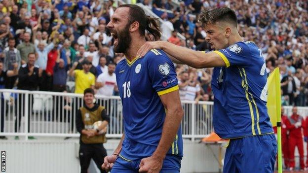 Kosovo players celebrate a goal against the Czech Republic