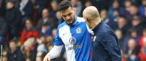 Tony Watt goes off injured for Blackburn Rovers