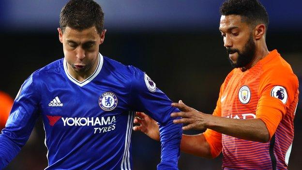 Chelsea's Eden Hazard and Gael Clichy of Manchester City