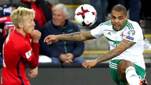 Josh Magennis attempts to launch an attack for Northern Ireland