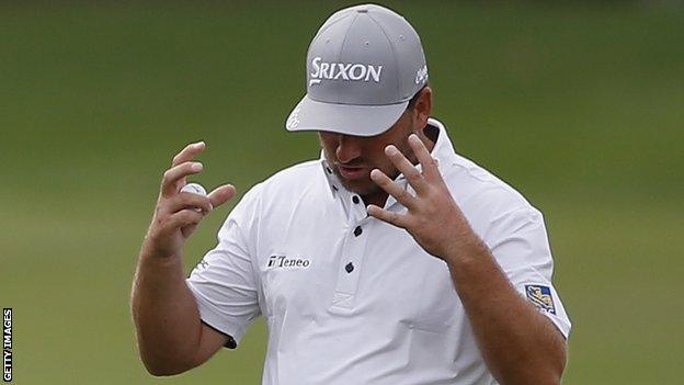 Graeme McDowell shows his frustration after realising his mistake on Saturday