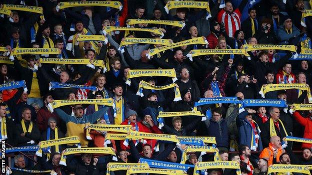 Southampton supporters took blue and yellow Saints scarves to Aston Villa to show their solidarity with Ukraine