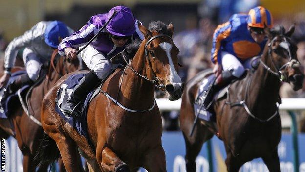 Minding triumphs in the 1000 Guineas at Newmarket