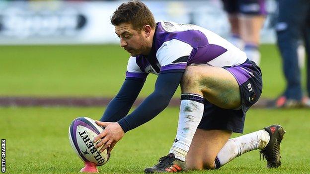 Greig Laidlaw lines up a kick at goal against France