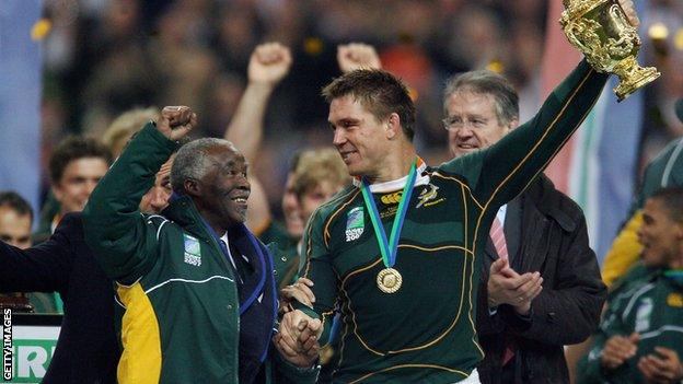 South Africa captain Smit receives the World Cup trophy with Thabo Mbeki