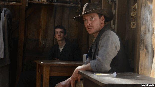 Michael Fassbender and Kodi Smit-McPhee