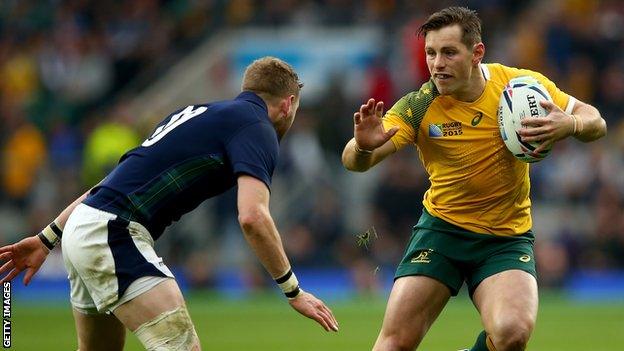 Bernard Foley in action against Finn Russell