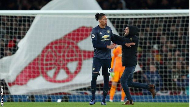 Chris Smalling was shoved by a fan during Manchester United's defeat by Arsenal