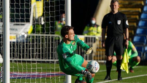 Simon Eastwood saves a penalty