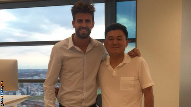 Gerard Pique and Rakuten CEO Hiroshi Mikitani