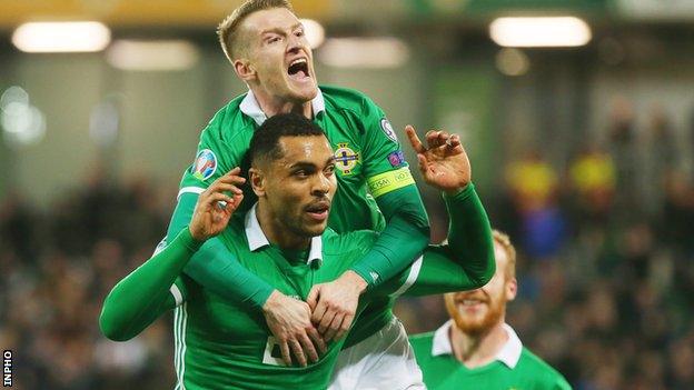 Northern Ireland's Josh Magennis and Steven Davis celebrate