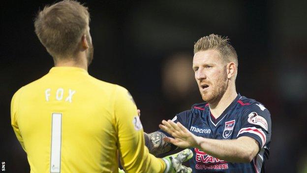 Ross County goalkeeper Scott Fox congratulates Michael Gardyne