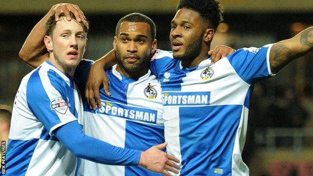 Bristol Rovers celebrate after Ellis Harrison's winning penalty