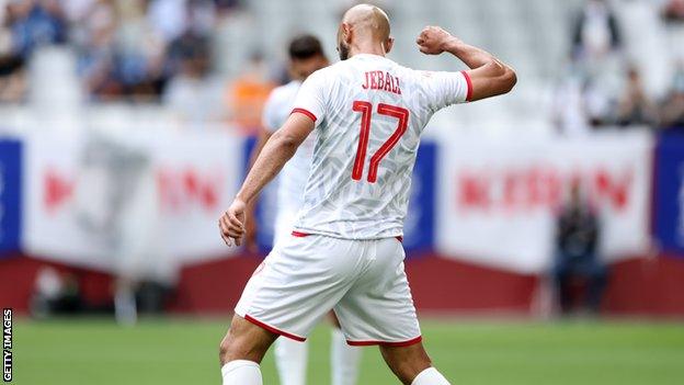 Tunisia's Issam Jebali celebrates