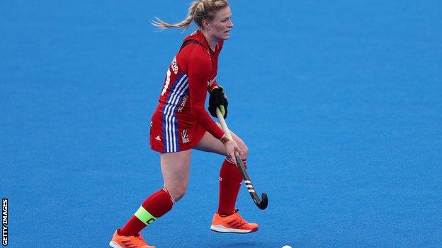 Hollie Pearne-Webb playing hockey for Great Britain