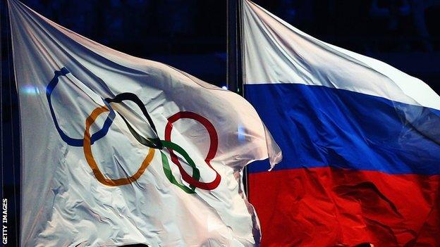 Olympic flag and Russia flag