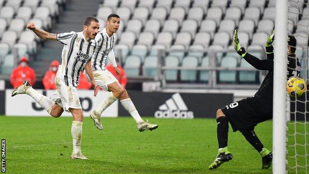 Leonardo Bonucci (left) scores the winning goal for Juventus against Torino