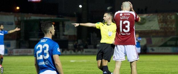 Alex Gogic concedes a penalty