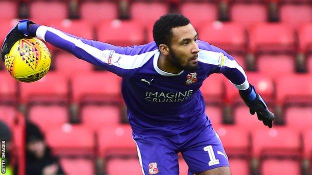 Lawrence Vigouroux in action for Swindon Town