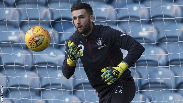 Liam Kelly warming up as a substitute for Rangers at Ibrox