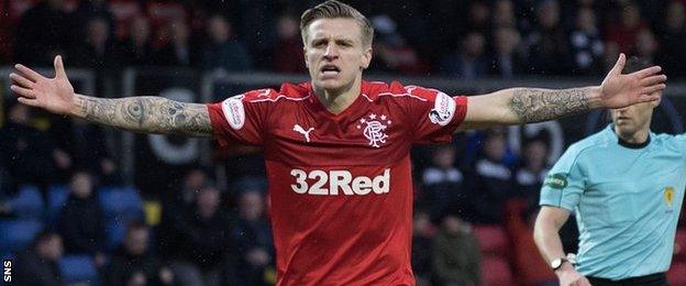 Rangers striker Jason Cummings celebrates scoring against Ross County