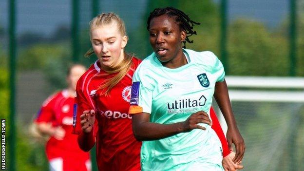 Falone Sumaili (right) in action for Huddersfield Town Women