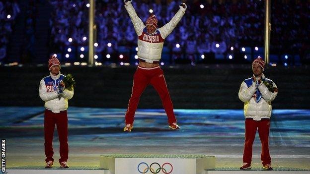 Vylegzhanin and Maxim Legkov celebrate winning Sochi medals