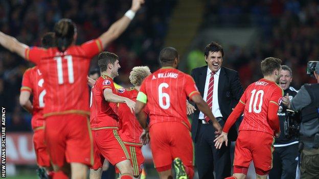 Wales players and manager Chris Coleman celebrate against Andorra